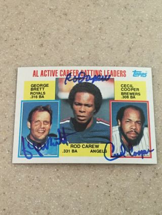 1984 Topps 710 Signed By All Three George Brett,  Rod Carew,  Cecil Cooper