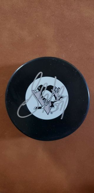Sidney Crosby Autographed Puck With And Hologram,  Company Closed.  Sig.