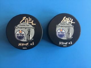 (2) Edmonton Oilers Hockey Pucks Signed By Grant Fuhr With " Hhof 03 " Inscription