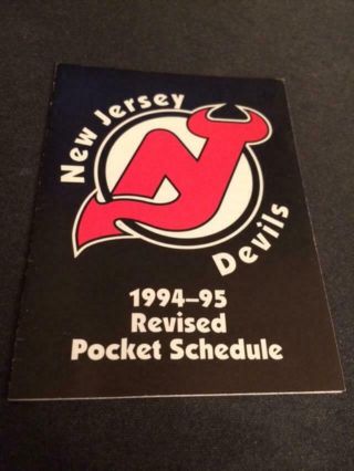 1994 - 95 Jersey Devils Hockey Pocket Schedule Sharp Version Revised