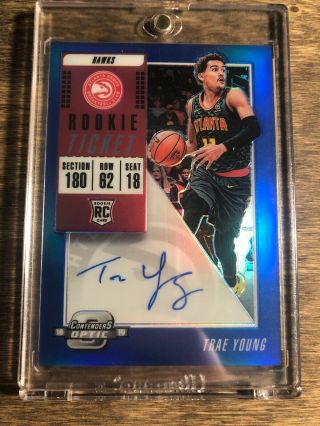 2018 - 19 Contenders Optic - Trae Young Blue Auto /49