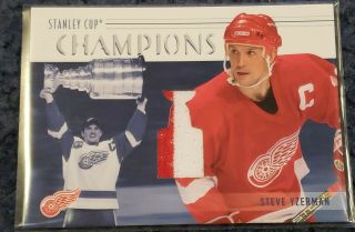 2002 - 03 BAP Memorabilia Series,  Stanley Cup Champs - Game Jersey,  Yzerman & Hasek 3