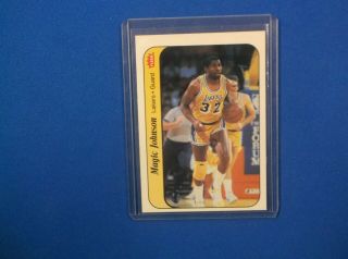 1986/87 Fleer Basketball Magic Johnson Sticker 7/11 Nmt