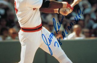 Jim Rice Autographed 8x10 Swinging In Red Helmet Photo - JSA Authenticated 2