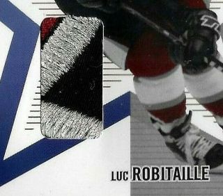 2002 - 03 Be A Player Memorabilia Emblem Luc Robitaille 3 - Color 1999 All Star Logo 2