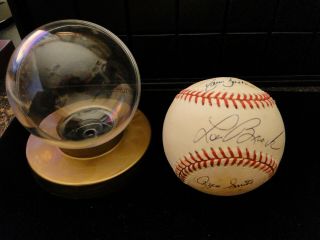 Autographed National League Mlb Baseball By Lou Brock,  Ozzie Smith,  David Justice
