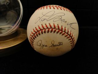 AUTOGRAPHED NATIONAL LEAGUE MLB BASEBALL BY LOU BROCK,  OZZIE SMITH,  DAVID JUSTICE 2