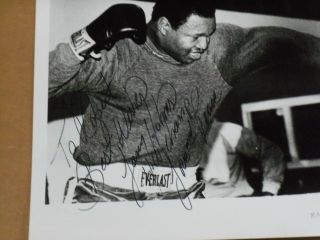 Larry Holmes,  Signed 8 x 10 Black and White Photo,  Training, 2