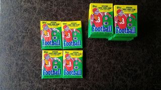 (1) 1986 Topps Football Wax Pack,  Rice Rc,  Steve Young Rc?