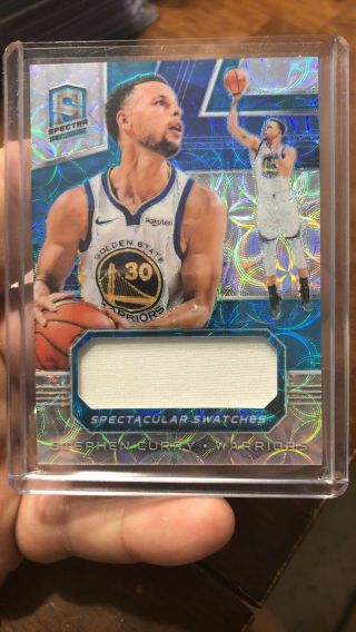 Stephen Curry 2018 - 19 Panini Spectra Blue Prizm Spectacular Swatches 8/49 White
