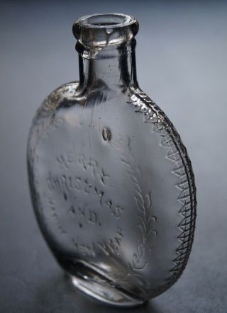 ANTIQUE MERRY CHRISTMAS AND HAPPY YEAR PUMPKIN SEED WHISKEY FLASK 2