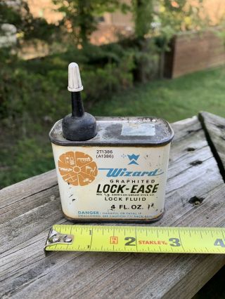 Rare Vintage Wizard Lock Fluid Handy Oiler 4 Oz Metal Oil Can Gas Sign