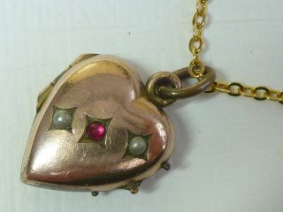 A Vintage/antique Rolled Gold Stone Set Heart Shaped Locket & Chain