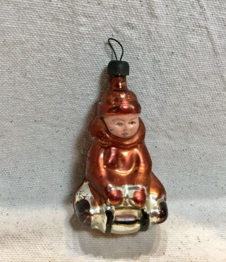 Antique German Figural Glass Christmas Ornament.  Boy On Sled