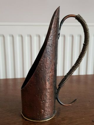 Arts And Crafts Hammered Copper Candlestick?