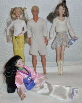 3 Vintage Barbie Dolls And Ken