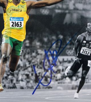 Autographed/ Signed Usain Bolt 8x10 Photo Olympic Gold JSA RARE Top Loader 2
