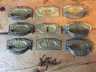 Set Of 6 Art Nouveau Pressed Brass Dresser Handles And Key Escutcheons