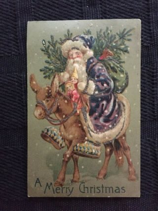 Antique Christmas Postcard - Santa In Brown Coat Riding Donkey With Toys/tree