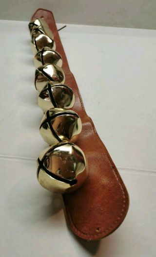 Antique Brass Sleigh Bells On A 24 " Leather Strap.  8 - 1 1/2 " Jingle Bells