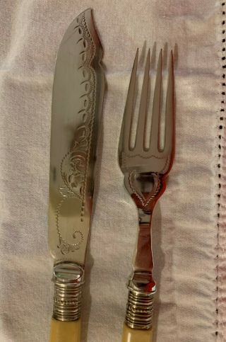 Antique silverplate fish knife and fork set,  Bakelite handles,  rare EMD stamp 2
