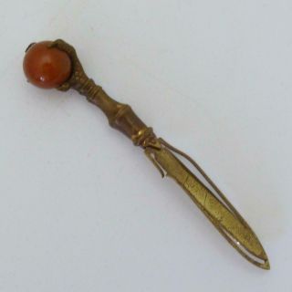 Antique Gilt Metal Claw And Carnelian Ball Bookmark