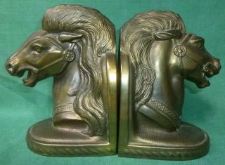 Metal Horse Bookends,  5 3/8 " High.  Golden Bronze Finish.  Marked " C.  Bmr "