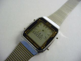 Rare Vintage Zeon 7 Melodies Wrist Watch; Chrono Lcd Digital Display Steel Link