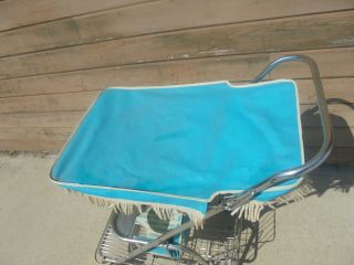 chromed metal baby push stroller with turquoise vinyl covered top wire basket 3