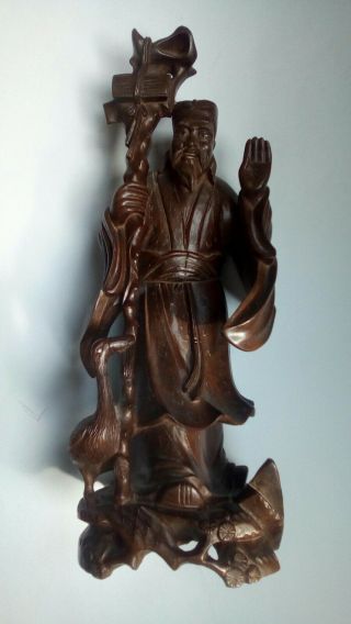 Antique Chinese Carved Wooden Figure With Brass Inlays.