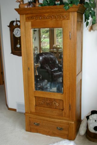 Antique Oak Armoire With Centered Mirrored Door