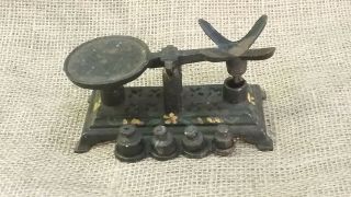 Vintage/antique Small Black Cast Iron Balance Scale With 4 Weights