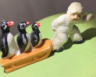 Rare Antique German Bisque Porcelain Snow Baby Pulling 3 Penguins On Sled.