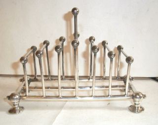 Very Collectable Rare Silver Plated Christopher Dresser Design Toast Rack C1890