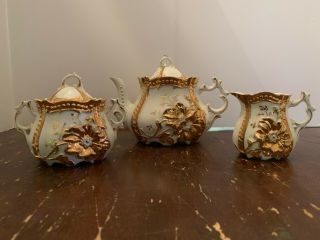 Antique Porcelain Teapot Sugar And Creamer 3 Piece Set Gold Flower Design