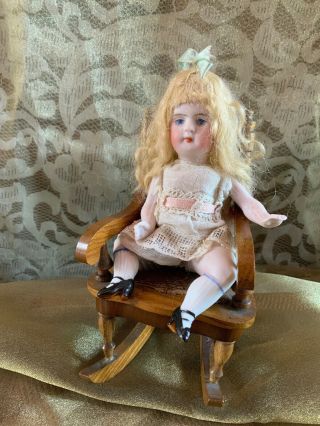 Very Rare.  Antique Small Sitting All Bisque Doll/chair