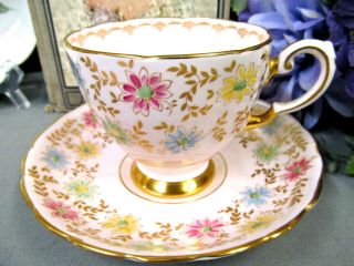 Tuscan Tea Cup And Saucer Painted Floral Gold Gilt Pink Base Teacup England