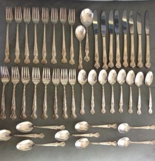 Wm Rogers Mfg Co.  Extra Plate Rogers Magnolia 40 Piece Set For 8