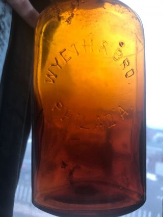 Wyeth & Bro Amber Glass Bottle With “philad A” Embossed.  Two Tone Amber Antique