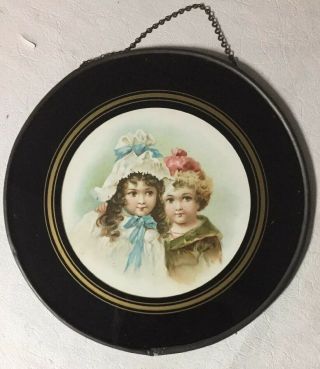 Reverse Black And Gold Painted Glass With Picture Of Two Children
