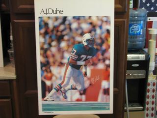 Vintage Miami Dolphins Player A.  J.  Duhe,  Rare,  Its 23 X 35,  It Was Dry Mounted Too