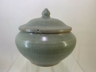 A Chinese Ming Dynasty Longquan Celadon Jar With Lid