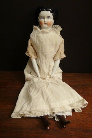 Antique Porcelain Doll With Antique Clothing / 18 "