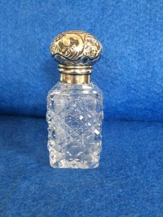 Antique Silver Topped Cut Glass Perfume Scent Bottle