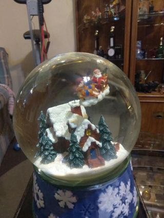Santa Flying Over Winter Village Rotating Musical Snow Globe Rare