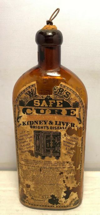 Antique Honey Amber Warner’s Safe Cure Quack Medicine Bottle Paper Label $1.  00