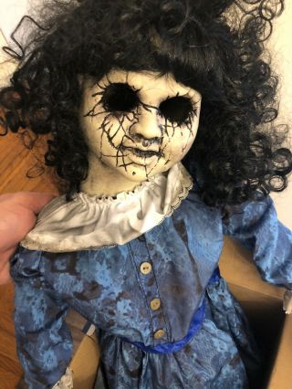 Spirit Halloween Roaming Antique Doll Bump and Go 2 Ft Tall Prop Lost Lizzie 3