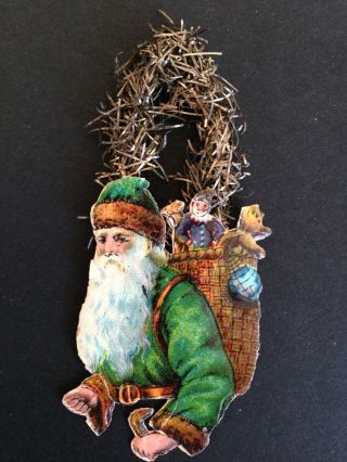 Antique Victorian Scrap Santa With A Green Coat Christmas Ornament
