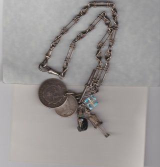 Silver Necklace With 3 Charms And 2 Coins Attached In