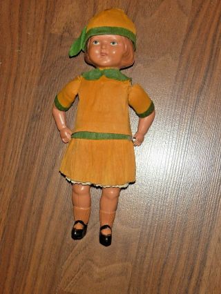 Vintage 8.  5 Inch Celluloid Doll With Crepe Paper Clothing